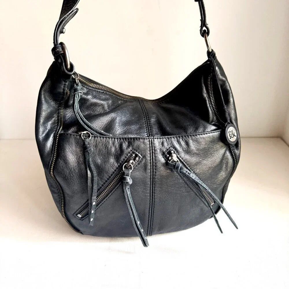 The Sak Black leather Zipper pocket Detail Oval Shoulder Bag